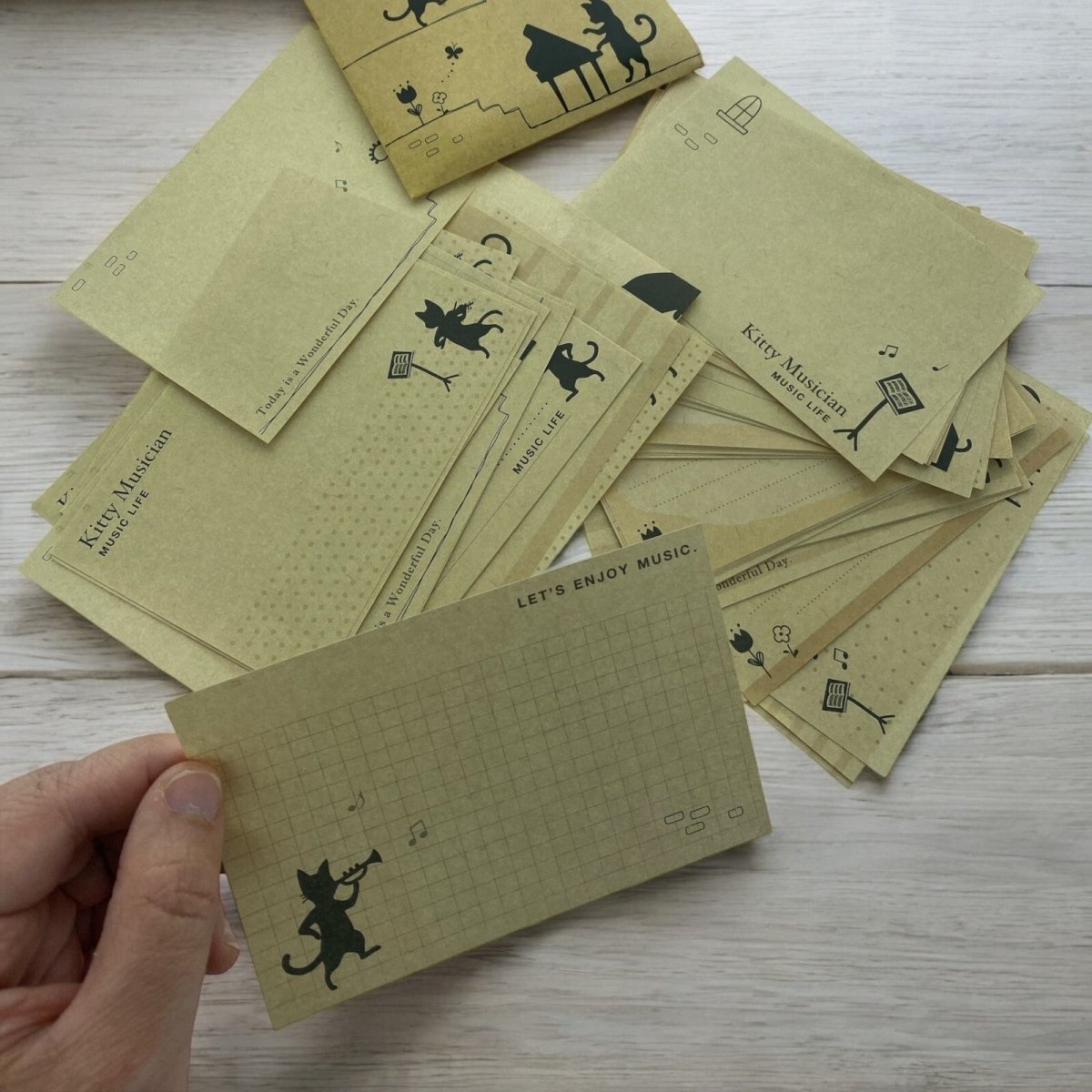 Musical Notes Memo Paper Set in a Pouch (75 Sheets, 25 Designs) - PartyErasers